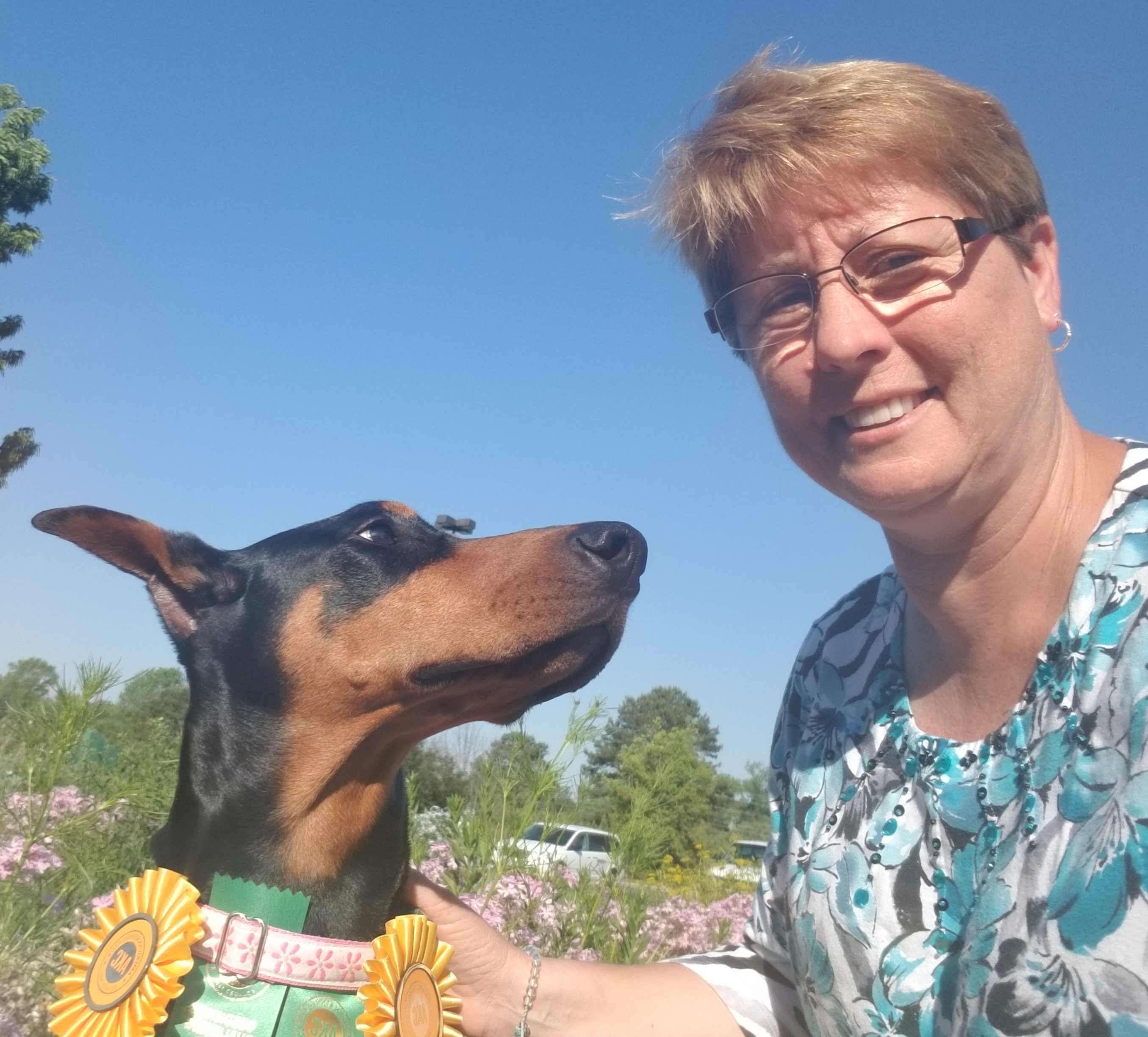 Certified dog trainer Wilson NC Tina Gay with dogs using force-free positive reinforcement