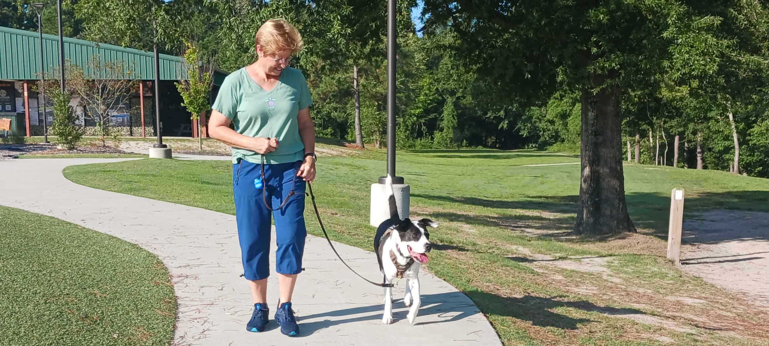 Tina with a calm, focused dog, Tina training a dog